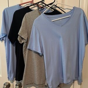 Lot of 4 Kim Rogers tops baby blue, black, gray